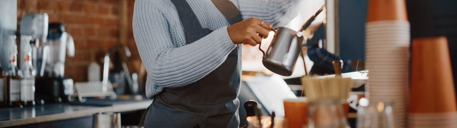 Restaurant worker making drinks