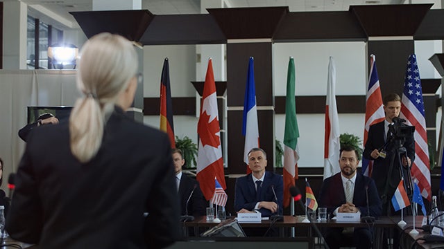 woman giving international speech
