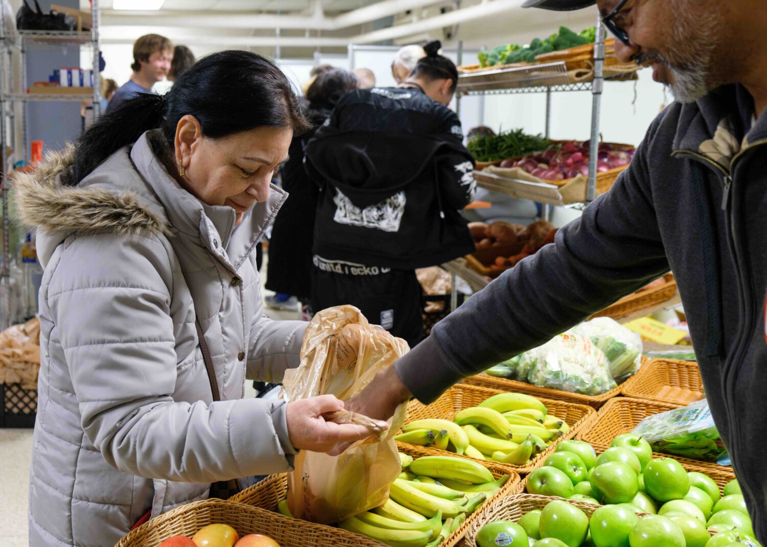 Neighbors in the River West neighborhood in Milwaukee, WI, find community and food at Kinship Community Food Center. Photo credit: Kinship Community Food Center